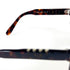 Vue latérale montrant les branches et les détails de la monture Persol