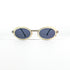 Lunettes Courrèges G100 vue de face sur fond blanc monture métal et coque ivoire