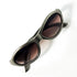 Lunettes Vuarnet vue du dessus - branches croisées et verres bruns