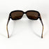 Profil latéral gauche des lunettes Dior vintage avec logo CD doré