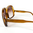 Vue de 3/4 des lunettes Saphira – signature cursive et strass sur la branche