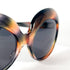Vue 3/4 des lunettes Maison Salanson – style années 70 revisité en acétate marbré