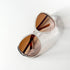 Vue de face de lunettes Diesel blanches vintage, style années 2000